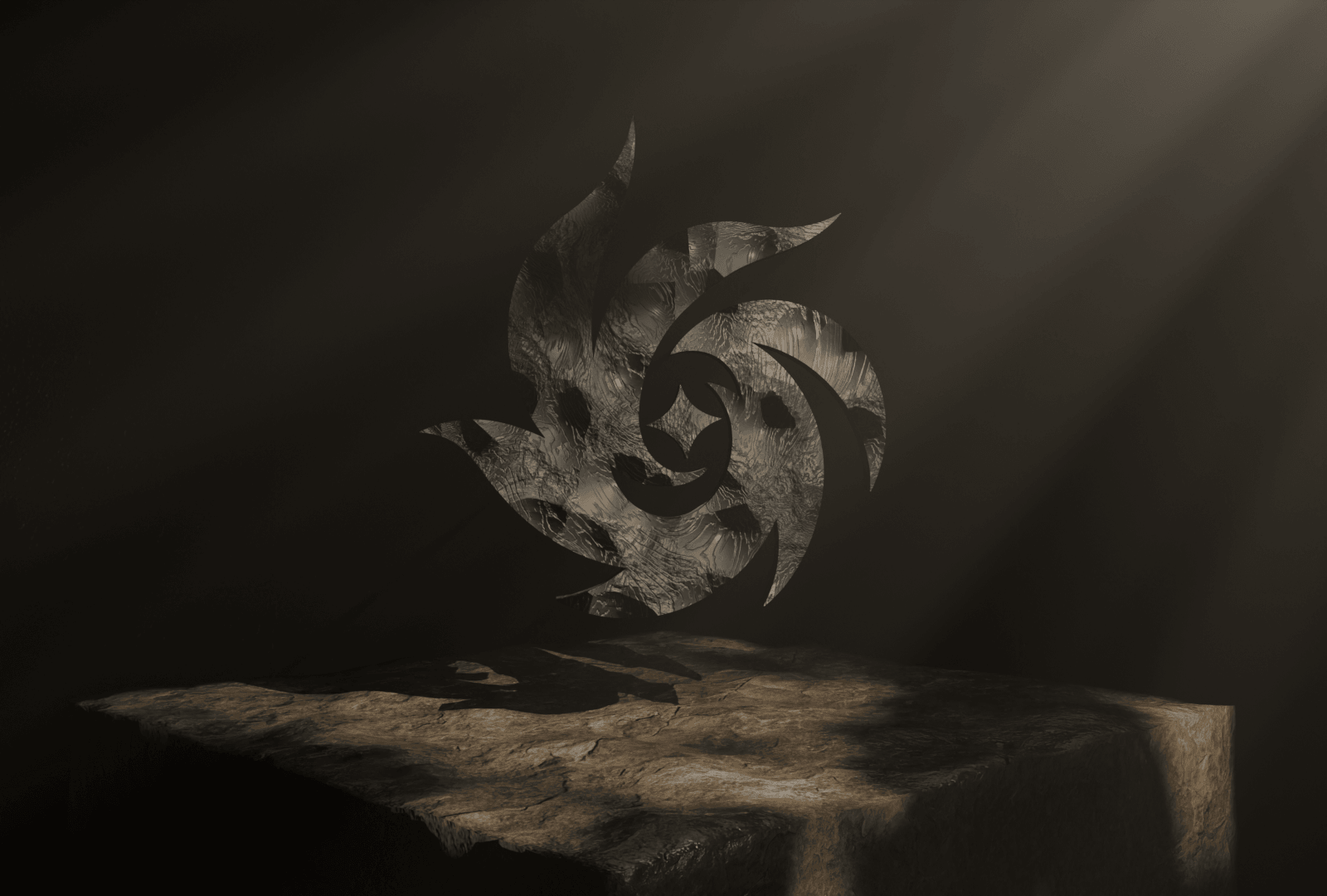 Obsidian studio object — a carved metallic emblem on a stone plinth