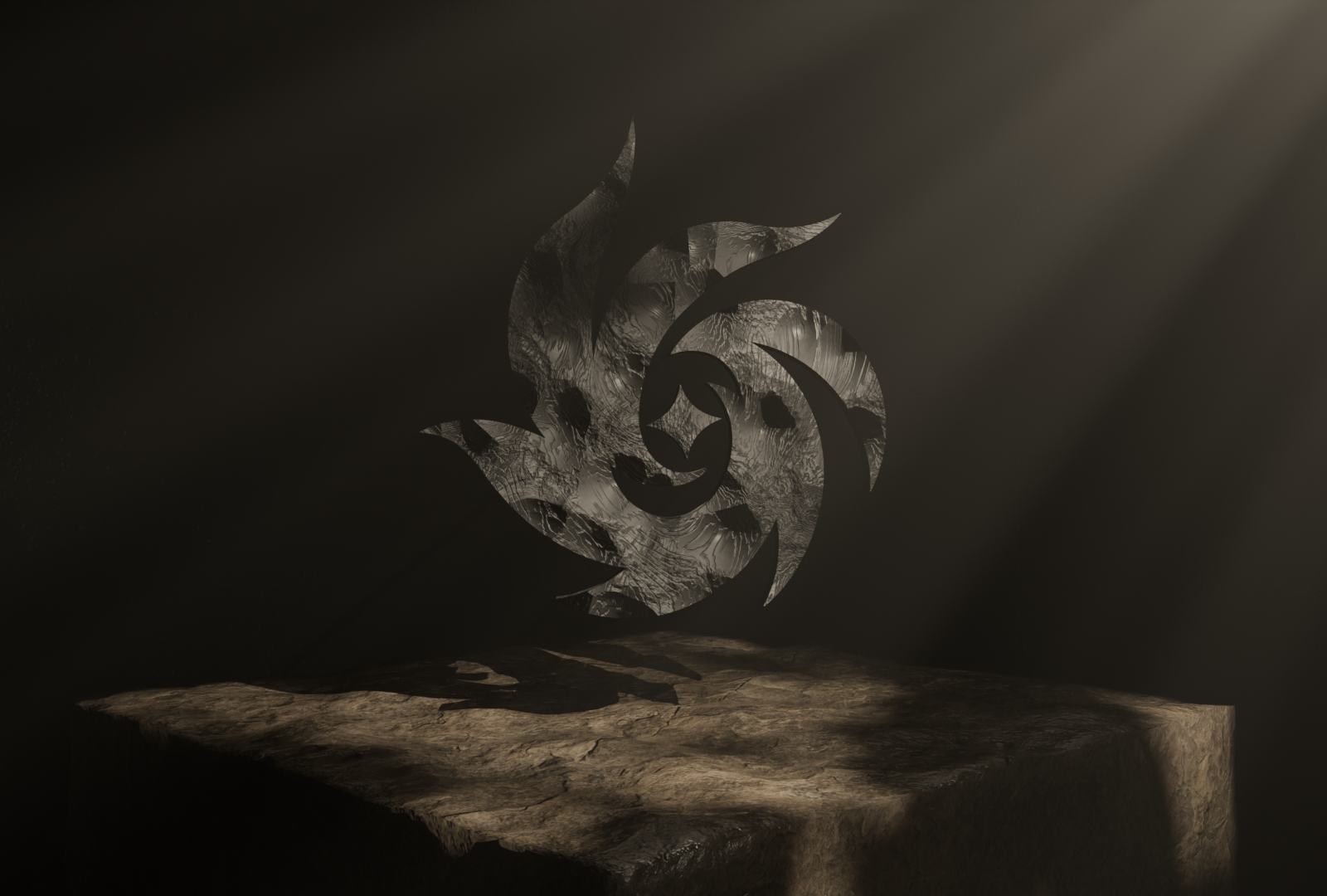 Obsidian studio object — a carved metallic emblem on a stone plinth